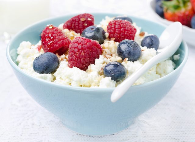 cottage cheese breakfast bowl with blueberries raspberries and nuts