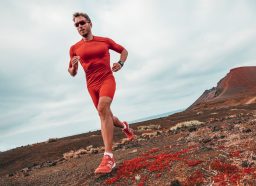 fit man sprinting in desert, concept of the best workout to test how fit you are