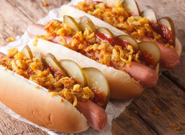 hot dog with crispy onions and bbq sauce