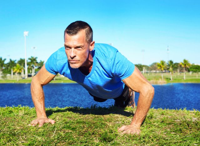 muscular man doing pushups, concept of daily bodyweight exercises for men