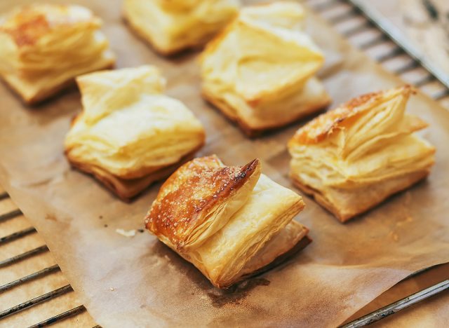 puff pastry rolls on parchment paper