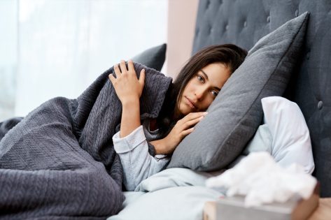Signs You're Too Sick to Work, Experts Say